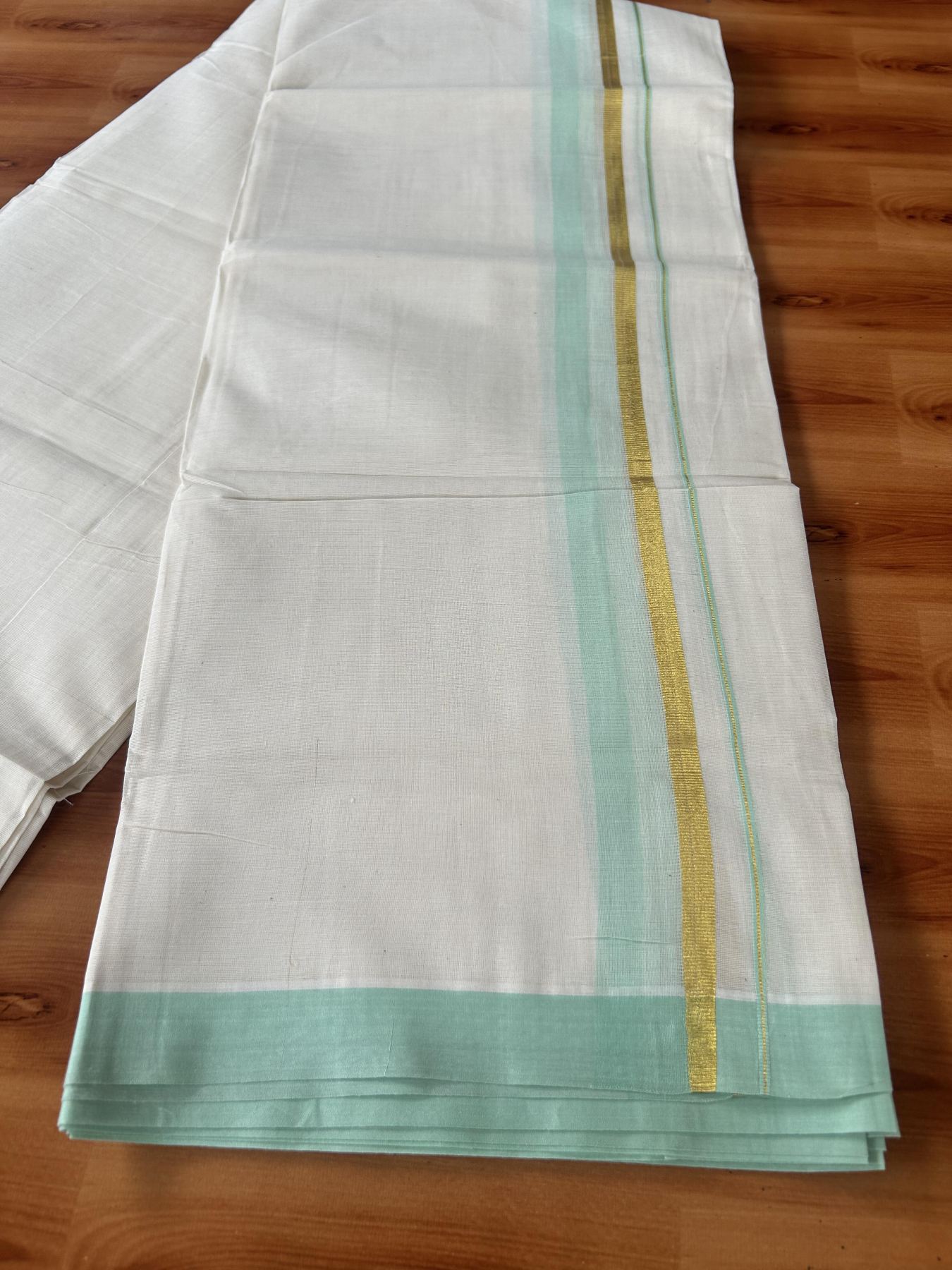 Double Off White (Unbleached) Mundu/Dothi- 20% Discount! Kaitharikada 100% Pure Cotton - 100x80 - 1.5 inch Gold Kasav & Mint Green Shaded Kara 4 mtr (8.5 muzham) - 5 KK5455 THI