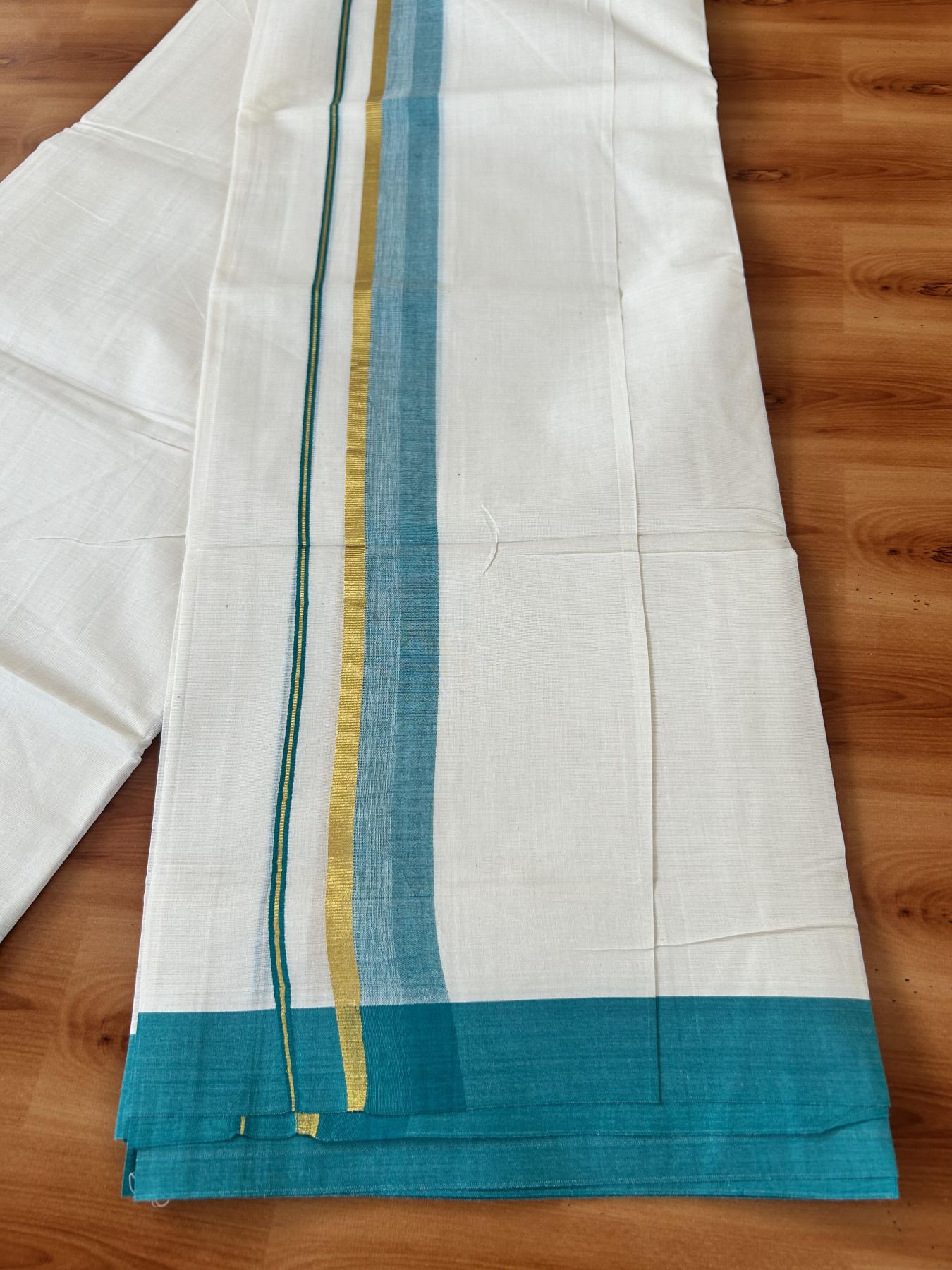 Double Off White (Unbleached) Mundu/Dothi- 20% Discount! Kaitharikada 100% Pure Cotton - 100x80 - 1.5 inch Gold Kasav & Teal Green Shaded Kara 4 mtr (8.5 muzham) - 9 KK5455 THI