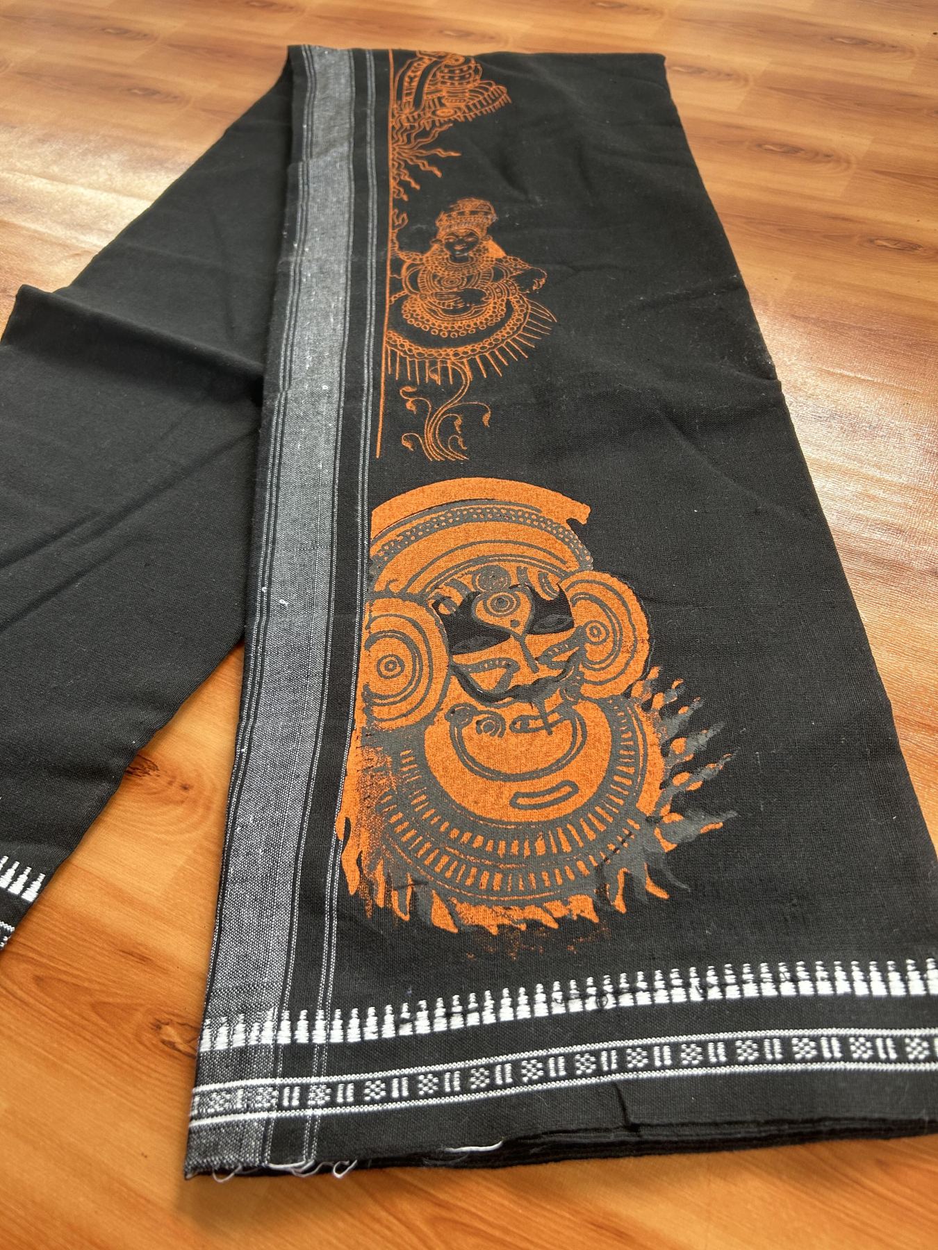Kaitharikada - Single Kaily / Lungi - Mixed Cotton - 40s twisted - 1.75 inch Orange Theyyam Design printed kuppadam kara with Black colour body (2 meter / 4 muzham) - 5 KK8055 SAT