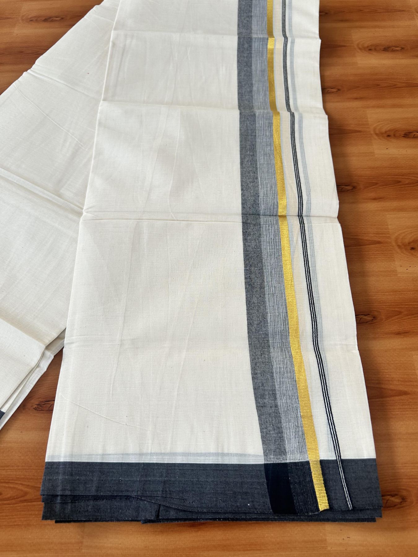 Double Off White (Unbleached) Mundu/Dothi- 20% Discount! Kaitharikada 100% Pure Cotton - 100x80 - 1.75 inch Gold Kasav & Black Shaded Kara 4 mtr (8.5 muzham) - 8 KK5455 THI