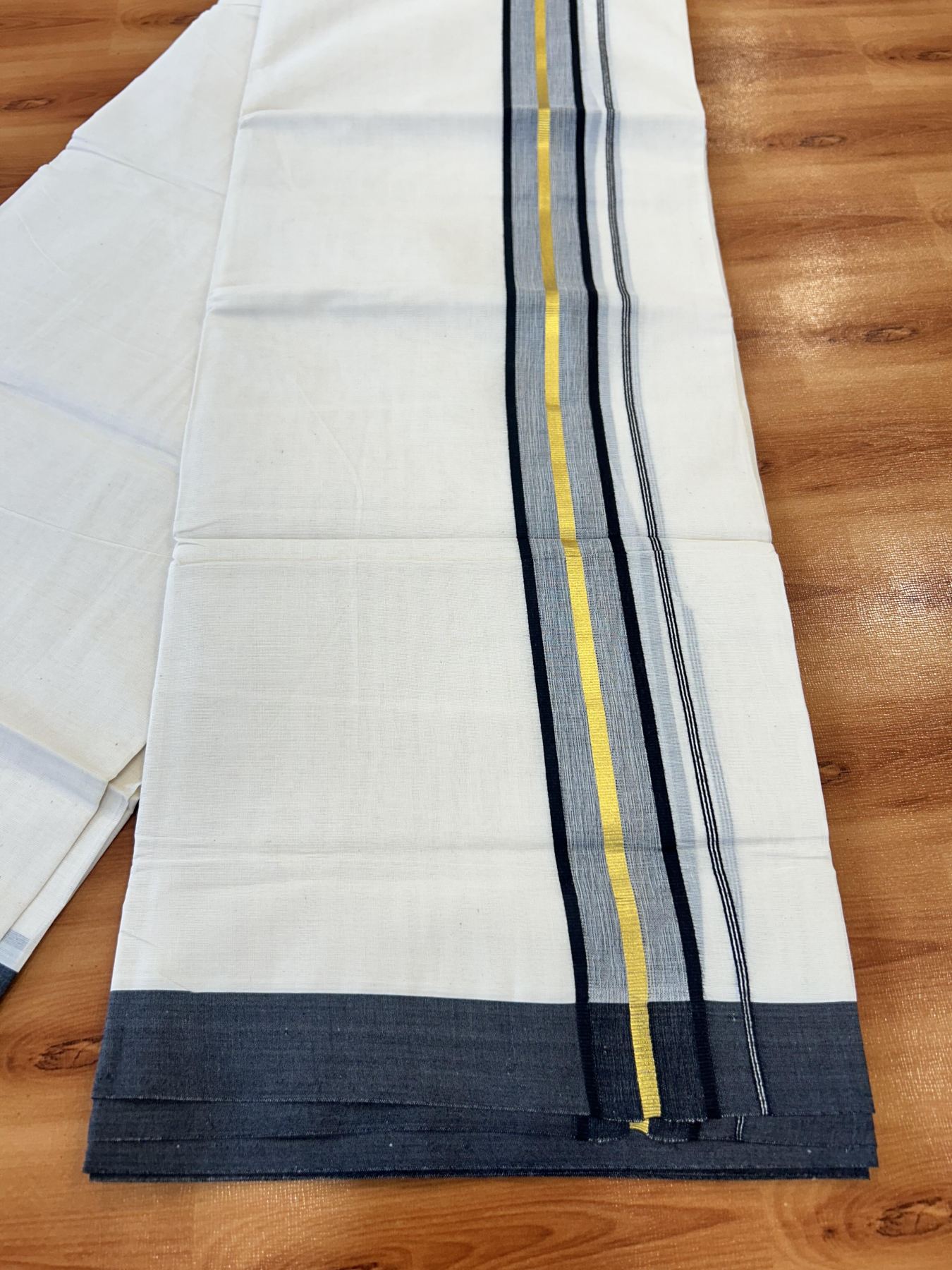 Double Off White (Unbleached) Mundu/Dothi- 20% Discount! Kaitharikada 100% Pure Cotton - 100x80 - 1.75 inch Gold Kasav & Black Shaded Kara 4 mtr (8.5 muzham) - 10 KK5455 THI