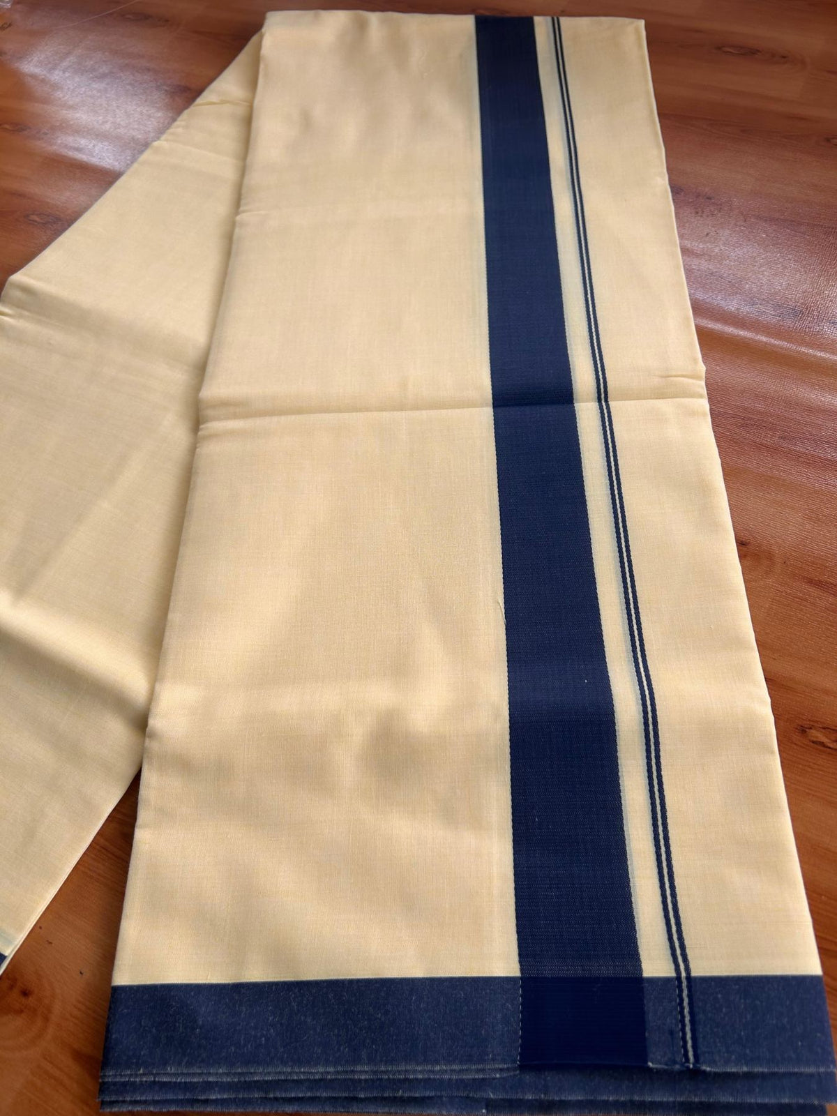 Kannur Yellow Double Mundu/Dhoti - 20% Discount! KaithariKada - 60s - 50% Cotton & 50% Polyester - Kannur Yellow Colour Body with 1.25 inch Navy Blue Kara - 4 mtr (8.5 muzham) - 4 KK5522 VAS